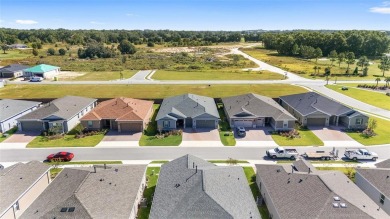 GORGEOUS ALMOST BRAND NEW 3/3/3 home in Ocala Preserve's gated on Trilogy at Ocala Preserve in Florida - for sale on GolfHomes.com, golf home, golf lot