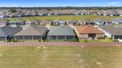 GORGEOUS ALMOST BRAND NEW 3/3/3 home in Ocala Preserve's gated on Trilogy at Ocala Preserve in Florida - for sale on GolfHomes.com, golf home, golf lot