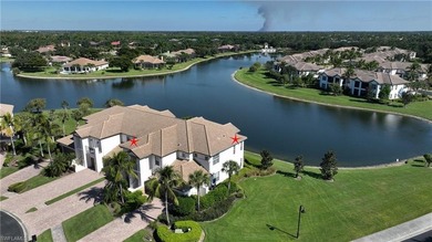 Indulge in resort-style luxury at this stunning top-floor end on Lely Resort Golf and Country Club in Florida - for sale on GolfHomes.com, golf home, golf lot