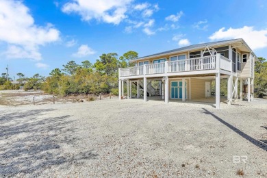 Discover your perfect coastal retreat in this beautifully on Kiva Dunes Golf Club in Alabama - for sale on GolfHomes.com, golf home, golf lot