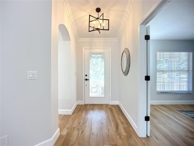 **PRICE IMPROVEMENT~ REMODELED POOL HOME!**SELLER WILL ASSIST on Caloosa Greens Executive Golf Course in Florida - for sale on GolfHomes.com, golf home, golf lot