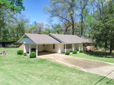 Perfect Location! 4BR 3BA - Drive your cart to the course! $314K on Panola Country Club in Mississippi - for sale on GolfHomes.com, golf home, golf lot