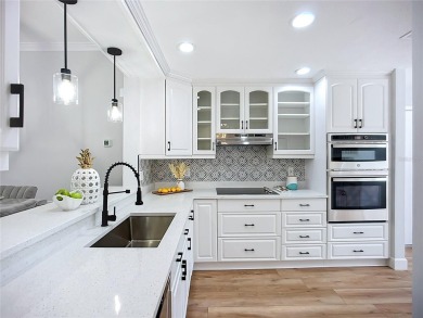 **PRICE IMPROVEMENT~ REMODELED POOL HOME!**SELLER WILL ASSIST on Caloosa Greens Executive Golf Course in Florida - for sale on GolfHomes.com, golf home, golf lot