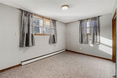 Welcome home to this lovingly cared for property in the heart of on Forest Hills Golf Club in Minnesota - for sale on GolfHomes.com, golf home, golf lot