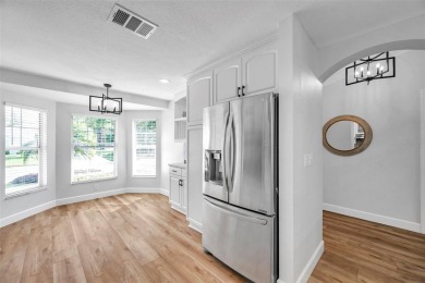 **PRICE IMPROVEMENT~ REMODELED POOL HOME!**SELLER WILL ASSIST on Caloosa Greens Executive Golf Course in Florida - for sale on GolfHomes.com, golf home, golf lot