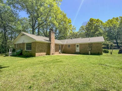 Perfect Location! 4BR 3BA - Drive your cart to the course! $314K on Panola Country Club in Mississippi - for sale on GolfHomes.com, golf home, golf lot