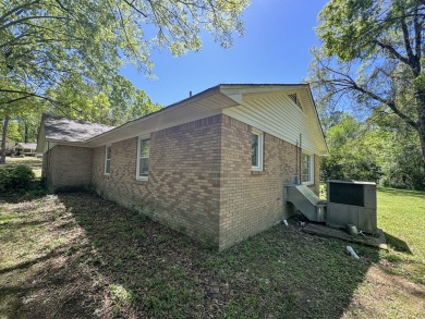 Perfect Location! 4BR 3BA - Drive your cart to the course! $314K on Panola Country Club in Mississippi - for sale on GolfHomes.com, golf home, golf lot