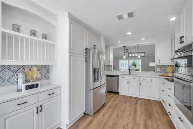 **PRICE IMPROVEMENT~ REMODELED POOL HOME!**SELLER WILL ASSIST on Caloosa Greens Executive Golf Course in Florida - for sale on GolfHomes.com, golf home, golf lot