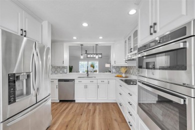 **PRICE IMPROVEMENT~ REMODELED POOL HOME!**SELLER WILL ASSIST on Caloosa Greens Executive Golf Course in Florida - for sale on GolfHomes.com, golf home, golf lot