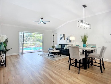 **PRICE IMPROVEMENT~ REMODELED POOL HOME!**SELLER WILL ASSIST on Caloosa Greens Executive Golf Course in Florida - for sale on GolfHomes.com, golf home, golf lot