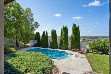 Discover this stunning 1.5-story home with seamless backyard on Hyperion Field Club in Iowa - for sale on GolfHomes.com, golf home, golf lot