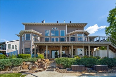 Discover this stunning 1.5-story home with seamless backyard on Hyperion Field Club in Iowa - for sale on GolfHomes.com, golf home, golf lot