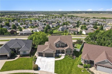 Discover this stunning 1.5-story home with seamless backyard on Hyperion Field Club in Iowa - for sale on GolfHomes.com, golf home, golf lot