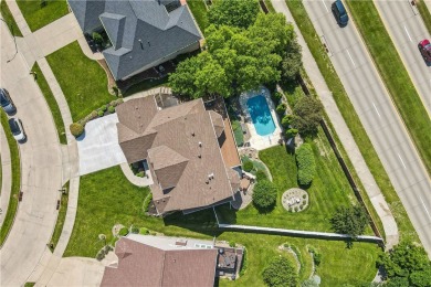 Discover this stunning 1.5-story home with seamless backyard on Hyperion Field Club in Iowa - for sale on GolfHomes.com, golf home, golf lot