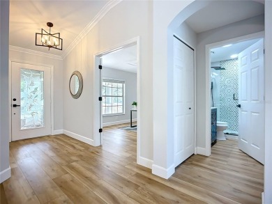 **PRICE IMPROVEMENT~ REMODELED POOL HOME!**SELLER WILL ASSIST on Caloosa Greens Executive Golf Course in Florida - for sale on GolfHomes.com, golf home, golf lot