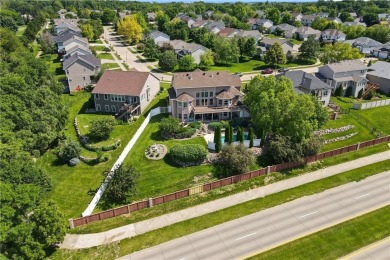 Discover this stunning 1.5-story home with seamless backyard on Hyperion Field Club in Iowa - for sale on GolfHomes.com, golf home, golf lot