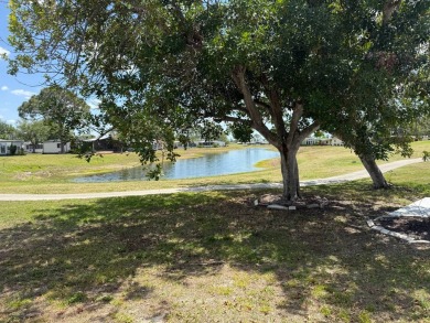 This lovely, manufactured home on leased land.   Priced to sell on Pine Lakes Country Club in Florida - for sale on GolfHomes.com, golf home, golf lot