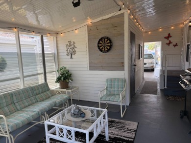 This lovely, manufactured home on leased land.   Priced to sell on Pine Lakes Country Club in Florida - for sale on GolfHomes.com, golf home, golf lot