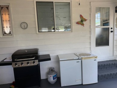 This lovely, manufactured home on leased land.   Priced to sell on Pine Lakes Country Club in Florida - for sale on GolfHomes.com, golf home, golf lot