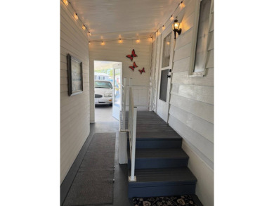 This lovely, manufactured home on leased land.   Priced to sell on Pine Lakes Country Club in Florida - for sale on GolfHomes.com, golf home, golf lot