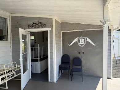 This lovely, manufactured home on leased land.   Priced to sell on Pine Lakes Country Club in Florida - for sale on GolfHomes.com, golf home, golf lot