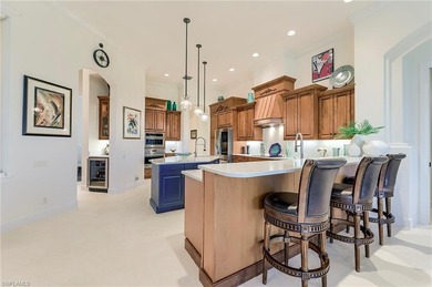 Overlooking the 18th hole of the renowned Shadow Wood Country on Shadow Wood Preserve in Florida - for sale on GolfHomes.com, golf home, golf lot