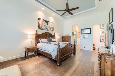 Overlooking the 18th hole of the renowned Shadow Wood Country on Shadow Wood Preserve in Florida - for sale on GolfHomes.com, golf home, golf lot