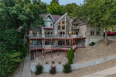 Discover your dream lakefront retreat! This stunning 5,700 sq ft on Bayview Golf Course in Missouri - for sale on GolfHomes.com, golf home, golf lot