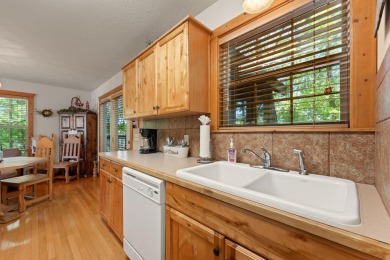 Escape to this charming 1-bedroom cabin/half-duplex nestled in on Ledgestone Country Club and Golf Course in Missouri - for sale on GolfHomes.com, golf home, golf lot
