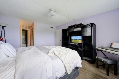 Wake up to stunning lake, golf course, and country club views in on Eastpointe Country Club in Florida - for sale on GolfHomes.com, golf home, golf lot