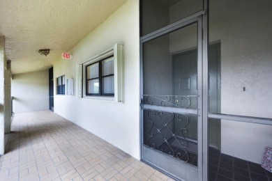 Wake up to stunning lake, golf course, and country club views in on Eastpointe Country Club in Florida - for sale on GolfHomes.com, golf home, golf lot