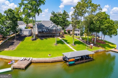 Stunning Lakefront Retreat with 225+ Feet of Shoreline  Welcome on Fairfield Plantation Golf and Country Club in Georgia - for sale on GolfHomes.com, golf home, golf lot