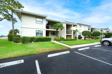 Wake up to stunning lake, golf course, and country club views in on Eastpointe Country Club in Florida - for sale on GolfHomes.com, golf home, golf lot