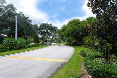 Wake up to stunning lake, golf course, and country club views in on Eastpointe Country Club in Florida - for sale on GolfHomes.com, golf home, golf lot