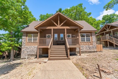 Escape to this charming 1-bedroom cabin/half-duplex nestled in on Ledgestone Country Club and Golf Course in Missouri - for sale on GolfHomes.com, golf home, golf lot