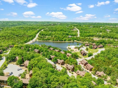 Escape to this charming 1-bedroom cabin/half-duplex nestled in on Ledgestone Country Club and Golf Course in Missouri - for sale on GolfHomes.com, golf home, golf lot