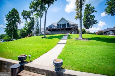 Stunning Lakefront Retreat with 225+ Feet of Shoreline  Welcome on Fairfield Plantation Golf and Country Club in Georgia - for sale on GolfHomes.com, golf home, golf lot