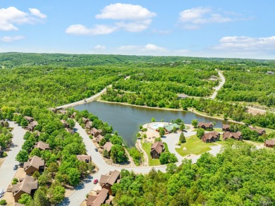 Escape to this charming 1-bedroom cabin/half-duplex nestled in on Ledgestone Country Club and Golf Course in Missouri - for sale on GolfHomes.com, golf home, golf lot