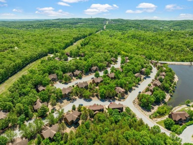Escape to this charming 1-bedroom cabin/half-duplex nestled in on Ledgestone Country Club and Golf Course in Missouri - for sale on GolfHomes.com, golf home, golf lot