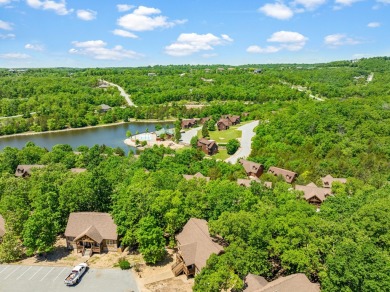 Escape to this charming 1-bedroom cabin/half-duplex nestled in on Ledgestone Country Club and Golf Course in Missouri - for sale on GolfHomes.com, golf home, golf lot