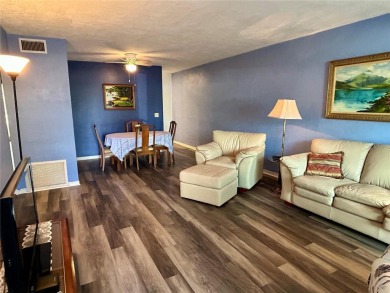 Welcome to your meticulously updated and furnished 2 bed, 1 bath on On Top Of The World Golf Course in Florida - for sale on GolfHomes.com, golf home, golf lot