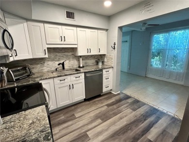 Welcome to your meticulously updated and furnished 2 bed, 1 bath on On Top Of The World Golf Course in Florida - for sale on GolfHomes.com, golf home, golf lot
