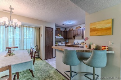 Spacious 3 bedroom condo offering generous living space & is on Seasons Ridge At Four Seasons in Missouri - for sale on GolfHomes.com, golf home, golf lot