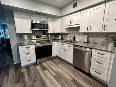 Welcome to your meticulously updated and furnished 2 bed, 1 bath on On Top Of The World Golf Course in Florida - for sale on GolfHomes.com, golf home, golf lot