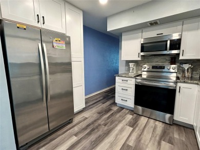Welcome to your meticulously updated and furnished 2 bed, 1 bath on On Top Of The World Golf Course in Florida - for sale on GolfHomes.com, golf home, golf lot