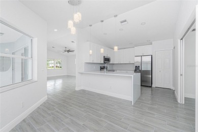 Fully Renovated Pool Home - No HOA, No Flood Insurance Required on Lemon Bay Golf Club in Florida - for sale on GolfHomes.com, golf home, golf lot