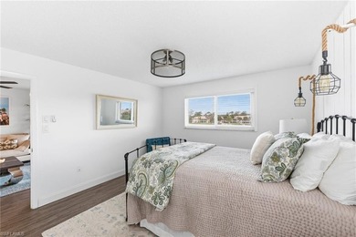 You can live in this bright sunlit quiet end unit situated in on Quail Run Golf Club In Naples in Florida - for sale on GolfHomes.com, golf home, golf lot