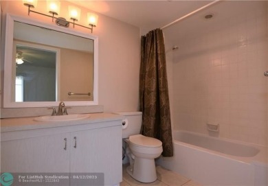 PENTHOUSE APT. GORGEOUS WATER AND GOLF VIEWS. 1 BEDROOM 1 1/2 on Wynmoor Golf Course in Florida - for sale on GolfHomes.com, golf home, golf lot