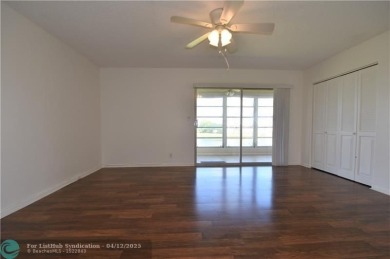 PENTHOUSE APT. GORGEOUS WATER AND GOLF VIEWS. 1 BEDROOM 1 1/2 on Wynmoor Golf Course in Florida - for sale on GolfHomes.com, golf home, golf lot