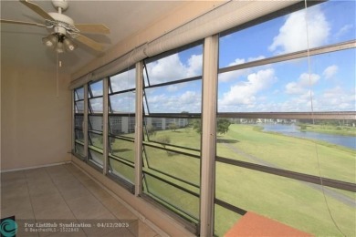 PENTHOUSE APT. GORGEOUS WATER AND GOLF VIEWS. 1 BEDROOM 1 1/2 on Wynmoor Golf Course in Florida - for sale on GolfHomes.com, golf home, golf lot